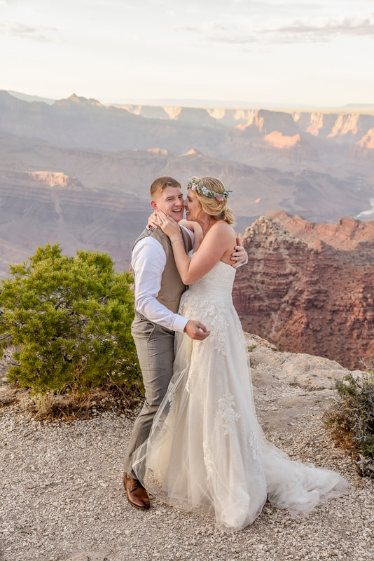 natural light grand canyon wedding couple laughing kissing playing dancing