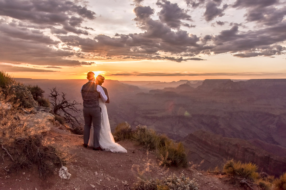 grand canyon elopement wedding couple watching sunset colorful