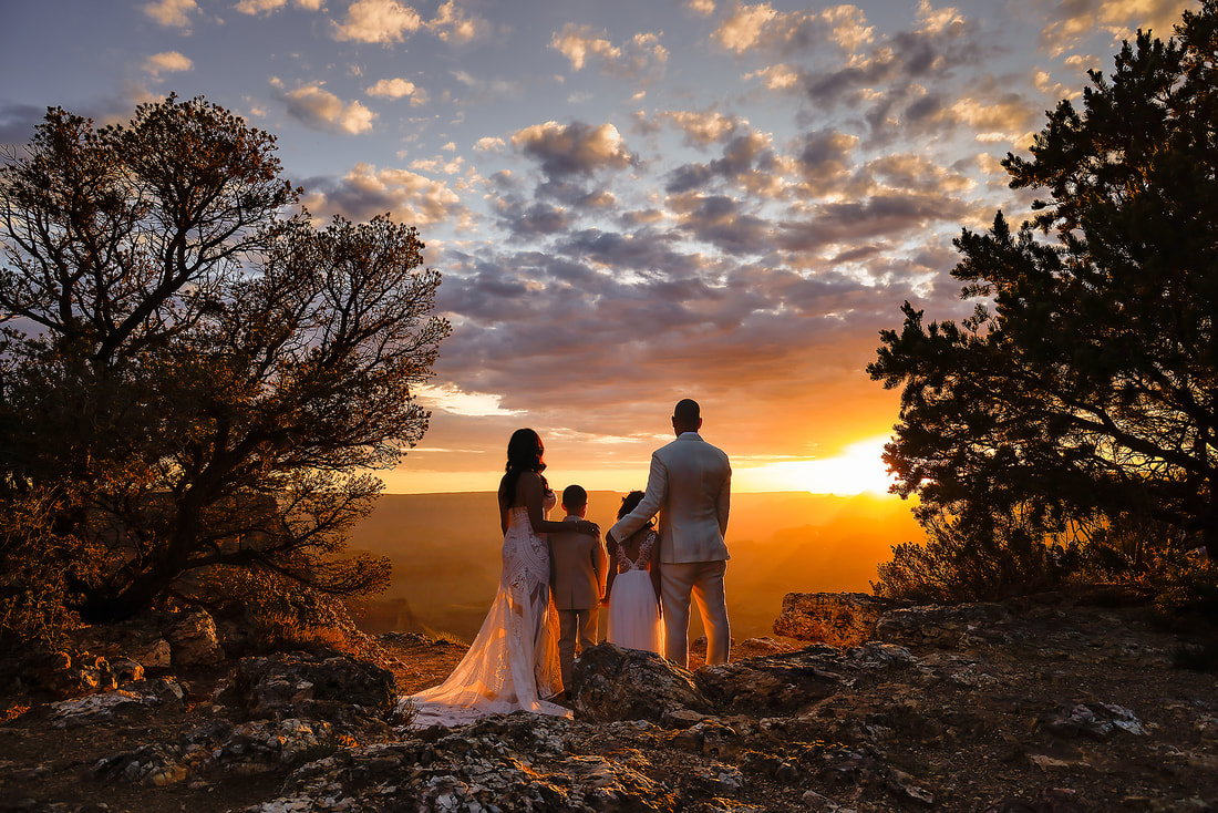 grand canyon elopement wedding couple watching sunset colorful