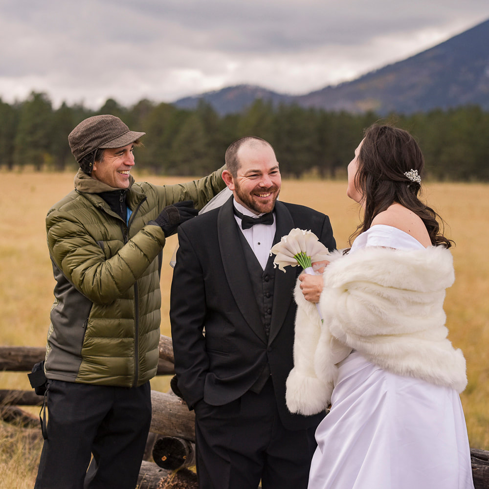 flagstaff wedding photographer helping groom 