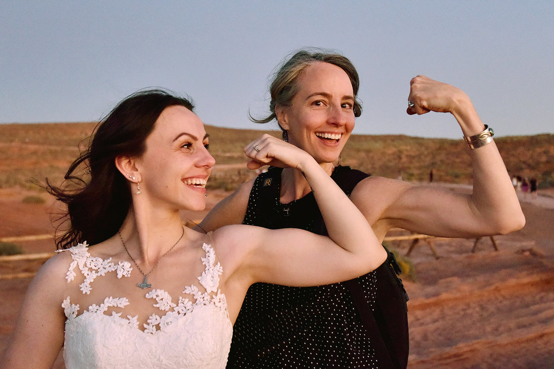 bride and photographer play and laugh together at horseshoe bend adventure elopement